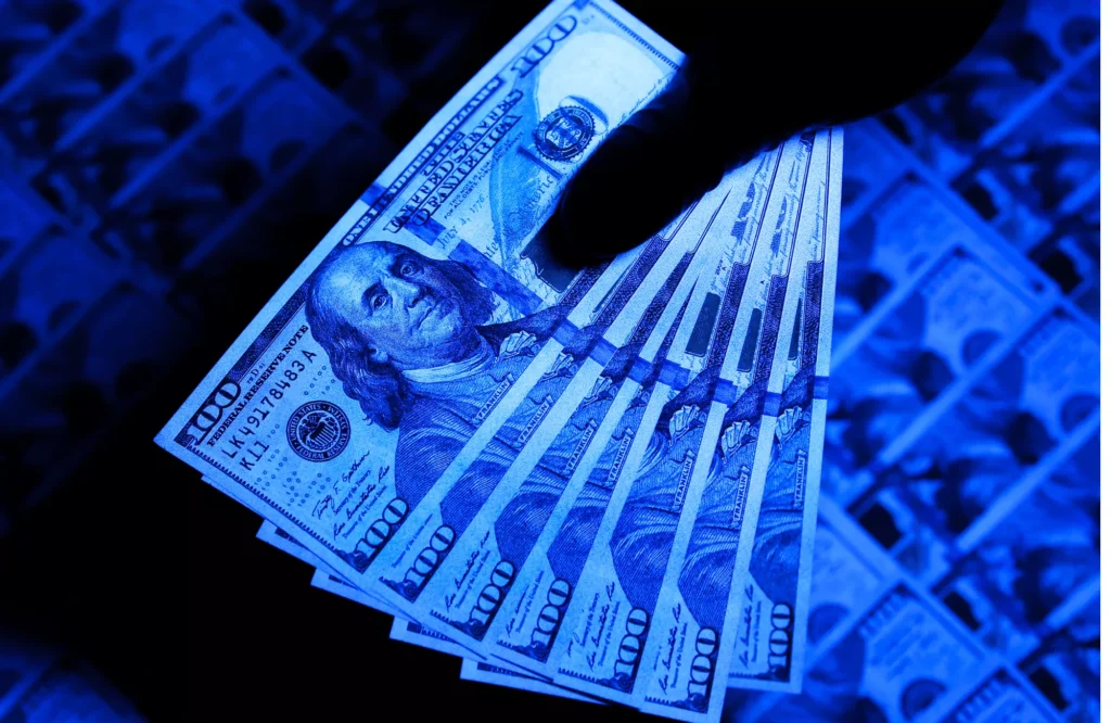 What color does fake money turn